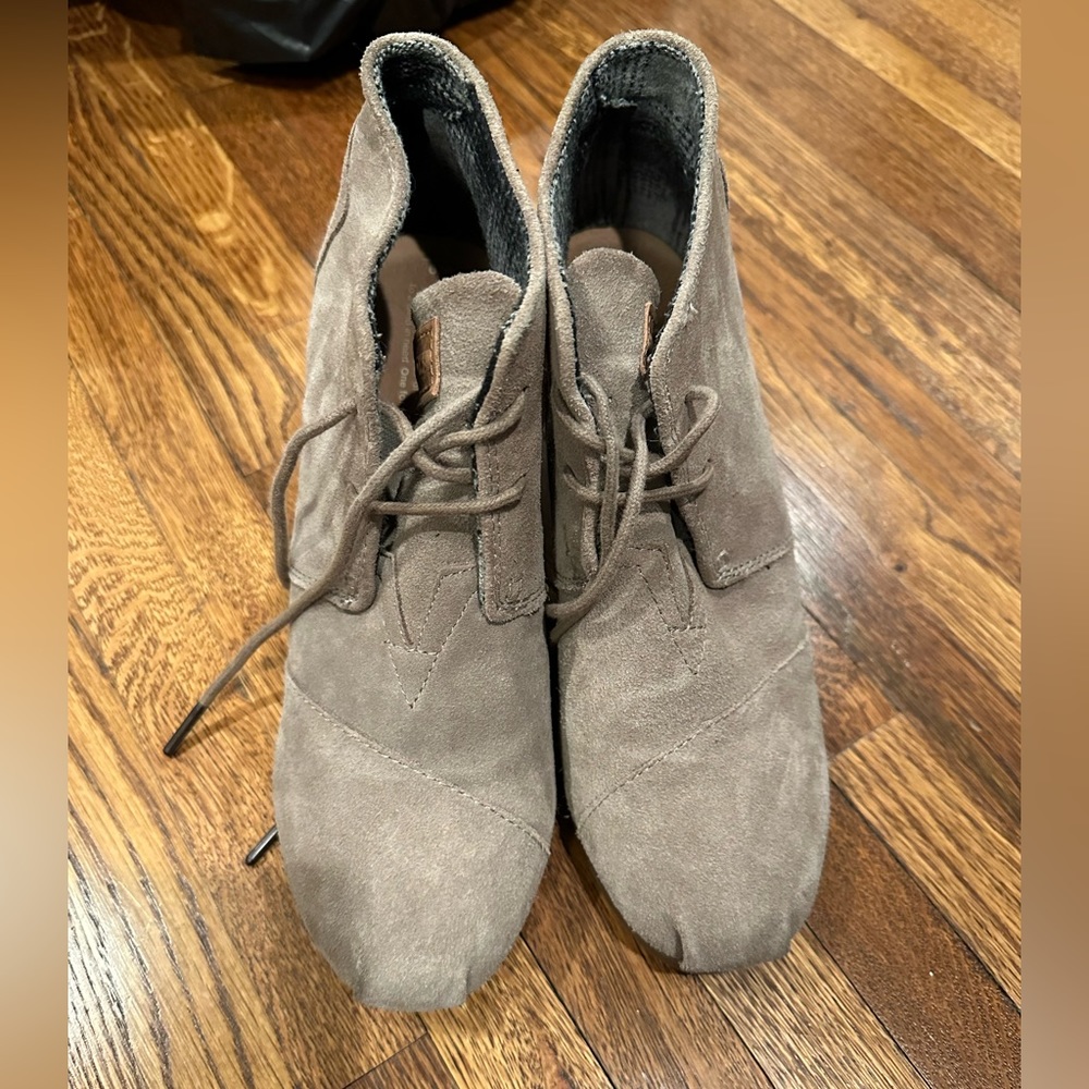 Tom’s ankle tie up wedge booties